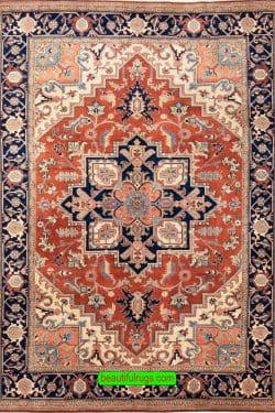 Handmade Persian Heriz wool rug in orange red color. Size 6.6x10.