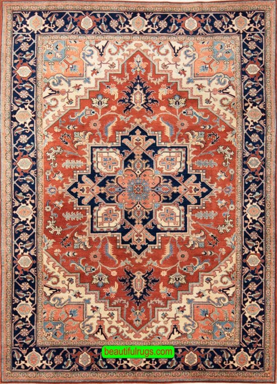 Handmade Persian Heriz wool rug in orange red color. Size 6.6x10.