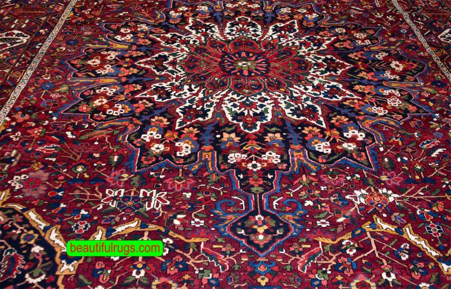 Antique Persian Bakhtiari rugs, floral, geometric rug in red color. Size 12.2x17.