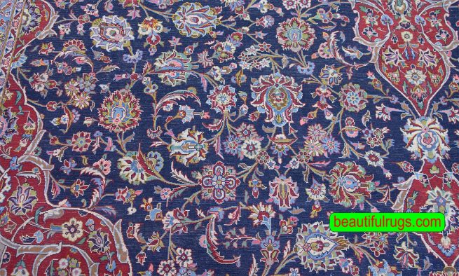 Persian Kashan wool rug with navy blue and red colors. Size 11.4x16.3.
