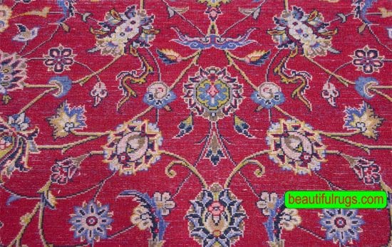 Handmade wool Persian Kashan area rug in red color and allover design. Size 6.6x9.7.