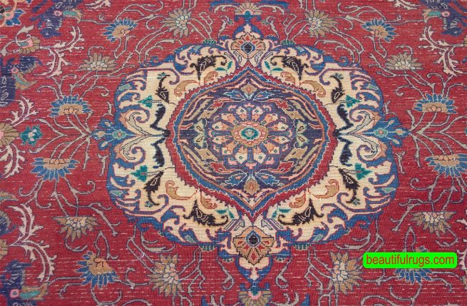 Handmade Persian Tabriz rug in red color. Size 6.10x10.2.