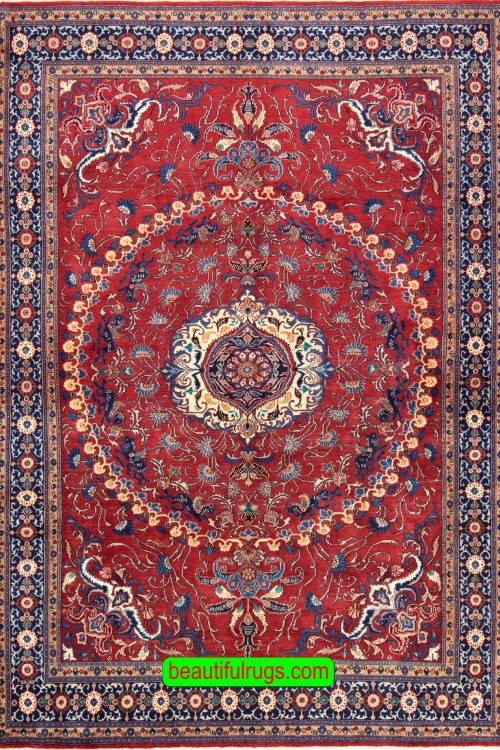 Handmade Persian Tabriz rug in red color. Size 6.10x10.2.