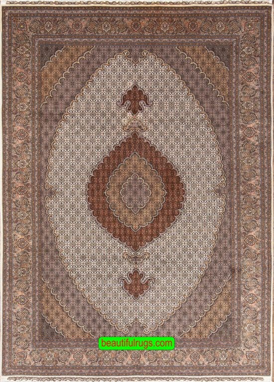 Hand knotted Persian Tabriz wool and silk rug in beige color. Size 6.8x10.