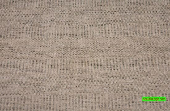Contemporary rug made in India with gray and beige colors. Synthetic fiber. Size 4.1x6.3.