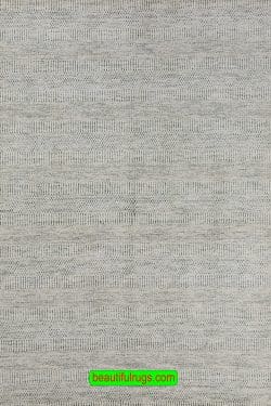 Contemporary rug made in India with gray and beige colors. Synthetic fiber. Size 4.1x6.3.