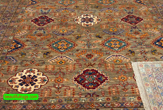 Hand knotted city made area rug in brown color. Geometric style Kazak rug. Size 8x10.3.