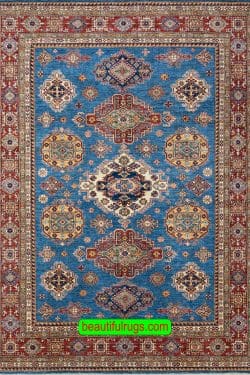 Geometric Kazak style rug in blue color made in Pakistan. Size 8.2x10.6.