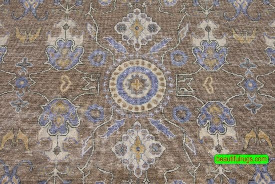 Contemporary area rug with pastel and taupe colors on sale. rug for under the dining table. size 9x12.4