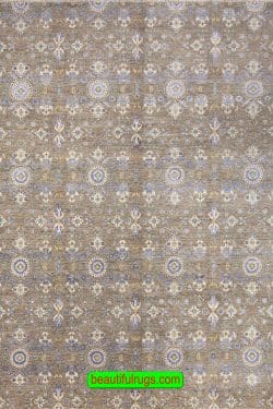 Contemporary area rug with pastel and taupe colors on sale. rug for under the dining table. size 9x12.4