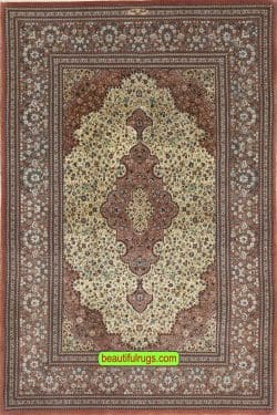 High quality hand knotted Persian Qum rug in beige color. Size 5.3x8.