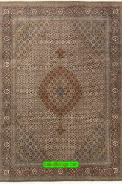 Handmade Persian Tabriz wool and silk rug with medallion in beige and green colors. Size 6.9x10.