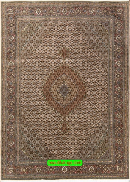 Handmade Persian Tabriz wool and silk rug with medallion in beige and green colors. Size 6.9x10.
