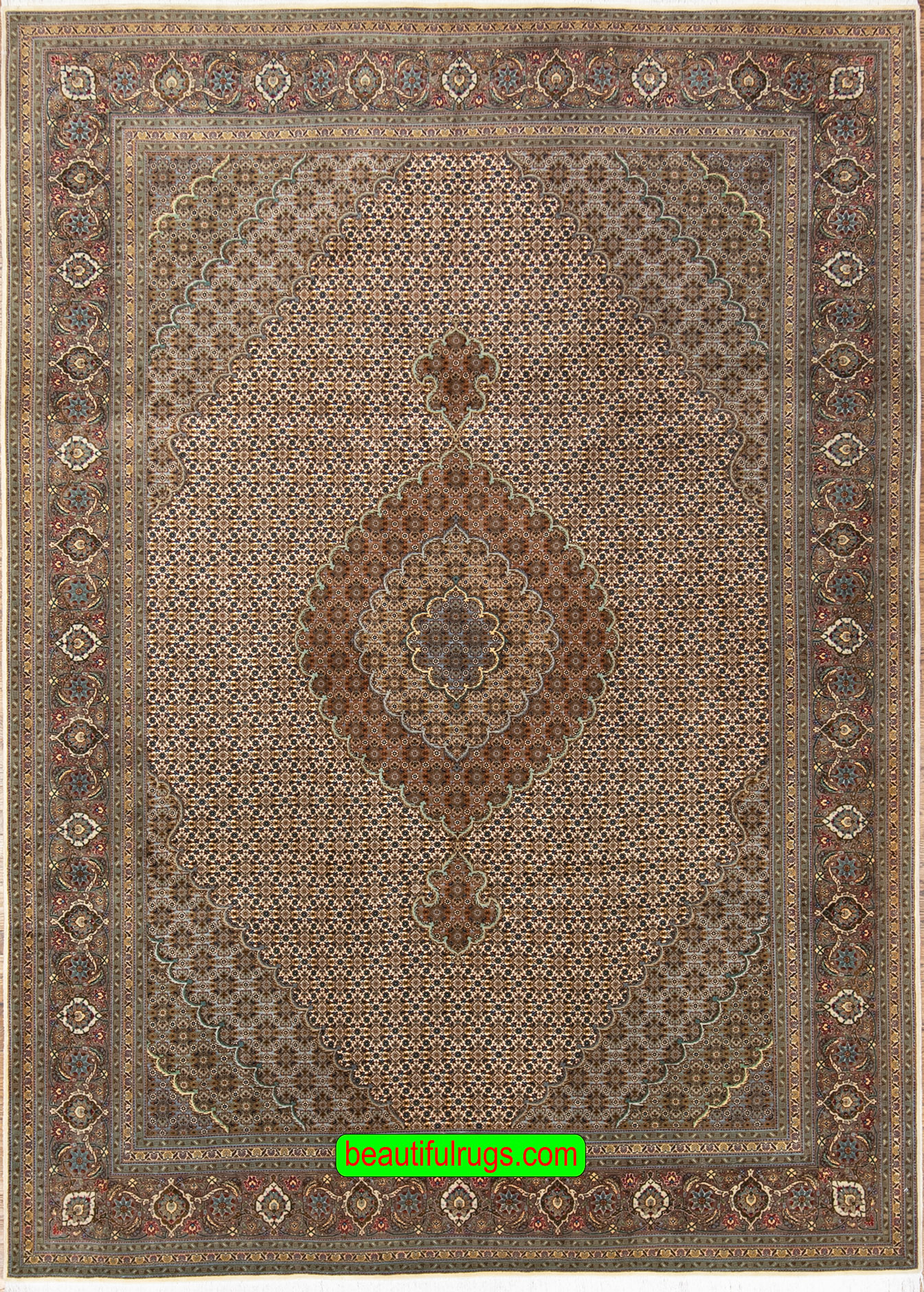 Handmade Persian Tabriz wool and silk rug with medallion in beige and green colors. Size 6.9x10.