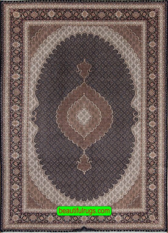 Handmade Persian Tabriz rug with black and brown colors with a large center medallion. Size 6.8x10.