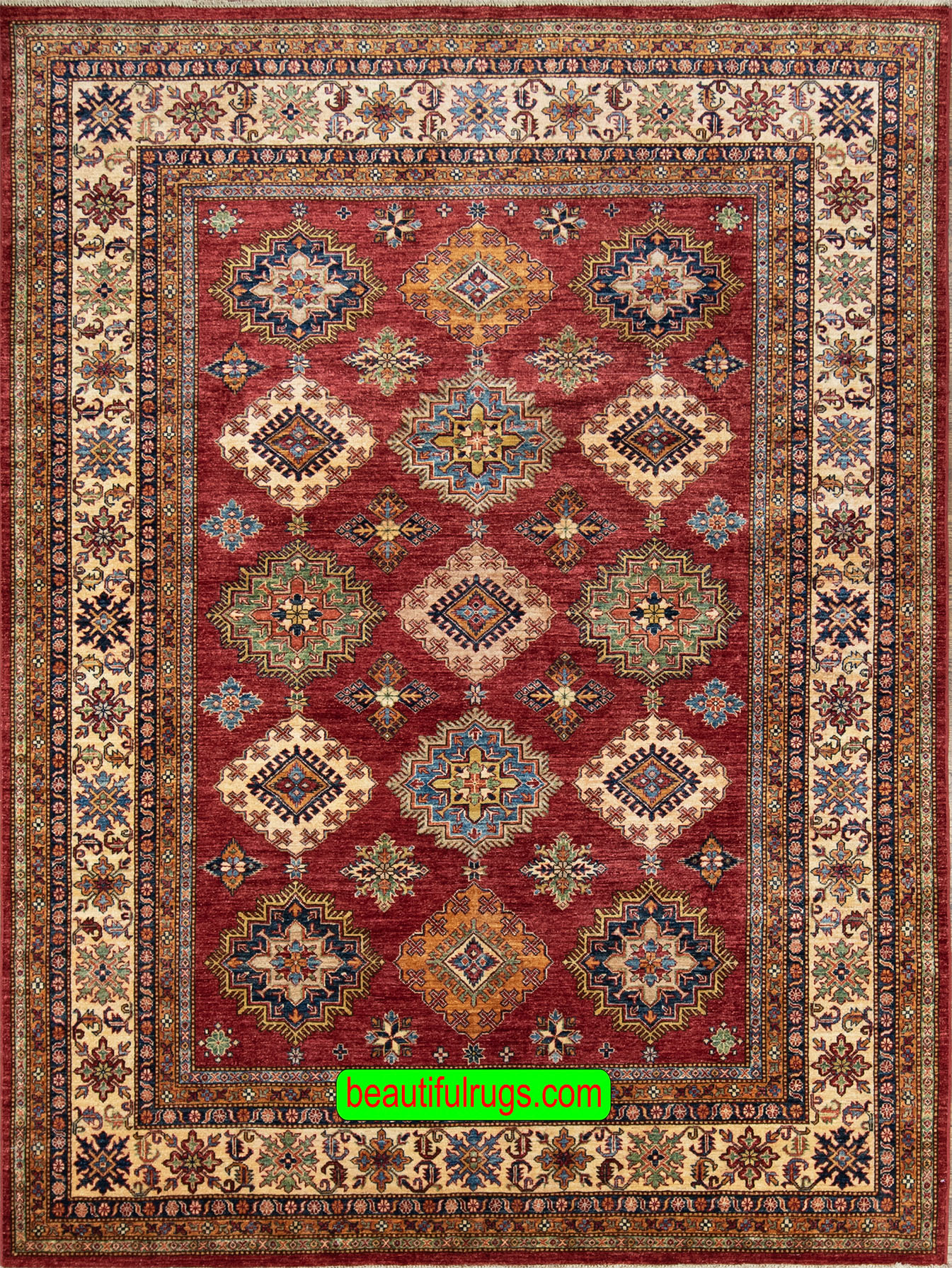 Hand knotted oriental carpet with red color in center and beige in borders, the design is Kazak.
