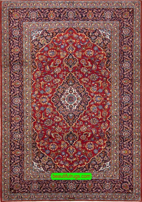 Discount area rug, floral Persian Kashan wool rug in red and navy blue colors. Size 7.3.x10.2.