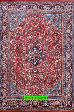 Handmade Persian Sarouk wool rug, traditional style Persian rug with red and navy blue. Size 7x10.2.