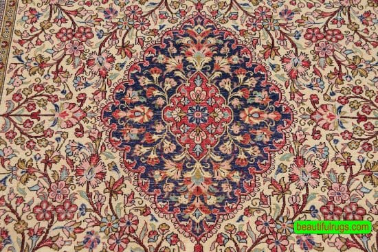 Hand knotted floral Persian Qum wool and silk rug in beige and navy blue color. Size 4.8x7.1.