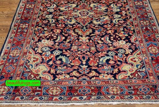 Vintage Persian Mahal wool rug with blue and red colors, floral design. Size 4.5x6.9.