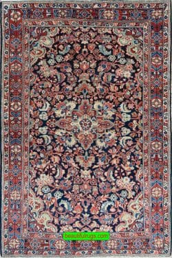 Vintage Persian Mahal wool rug with blue and red colors, floral design. Size 4.5x6.9.