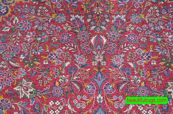 Handmade floral Persian Sarouk wool rug in red and beige colors. Size 4.3x6.9.