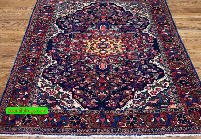 Handmade Persian tribal Borchaloo rug in navy blue color and geometric floral style. Size 5.1x6.8.