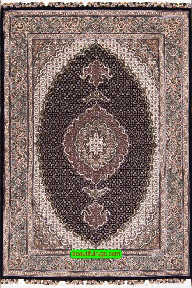A beloved design, handmade Persian Tabriz wool and silk rug in black and green colors. Size 3.6x5.