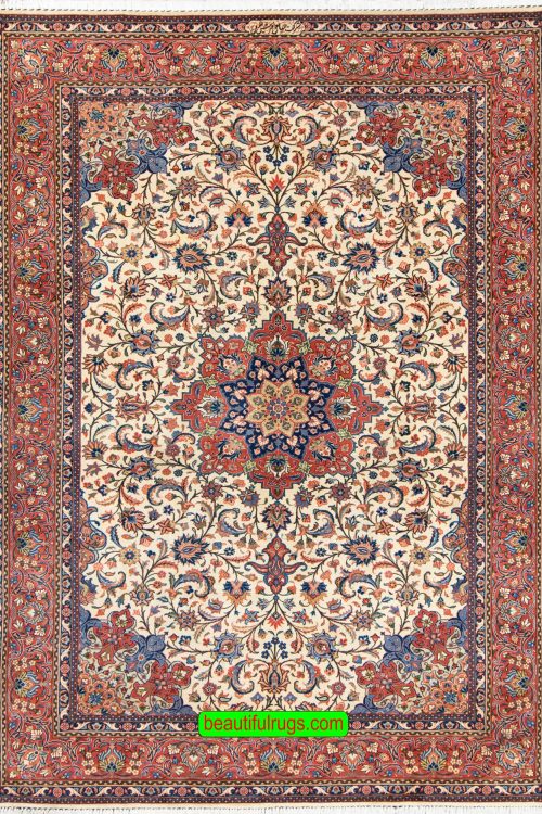 Handmade floral Persian Sarouk wool area rug with beige and red colors. Size 6.9x10.