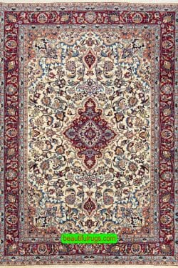 Hand knotted floral Iranian Mashad wool carpet in beige and merlot red color. Size 6.8x9.4.