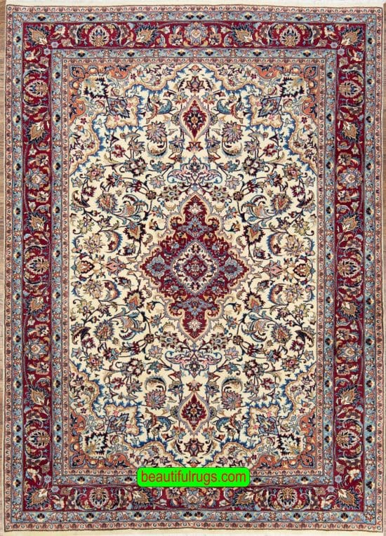 Hand knotted floral Iranian Mashad wool carpet in beige and merlot red color. Size 6.8x9.4.