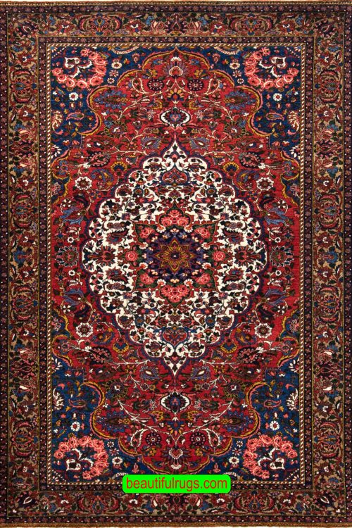 Handmade antique Persian Bakhtiari wool rug in red color. Size 5x7.8.