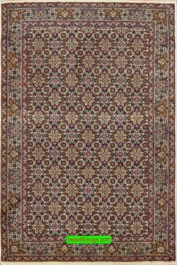 Handmade Persian area rug made of wool, multi color with pastel beige color in the main field and all-over design. Size 3.3x5.