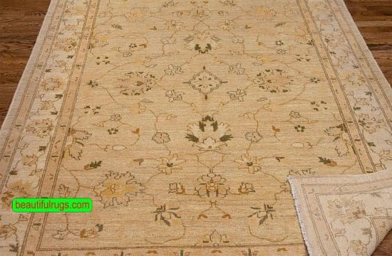 Handmade transitional style Pakistani wool oriental rug with beige and green colors. Size 5.8x7.9.