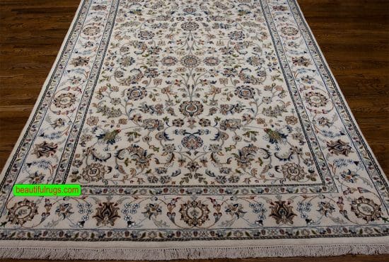 Hand knotted Oriental area rug in beige color, Nain design rug with all over patter. Size 6.1x9.3.