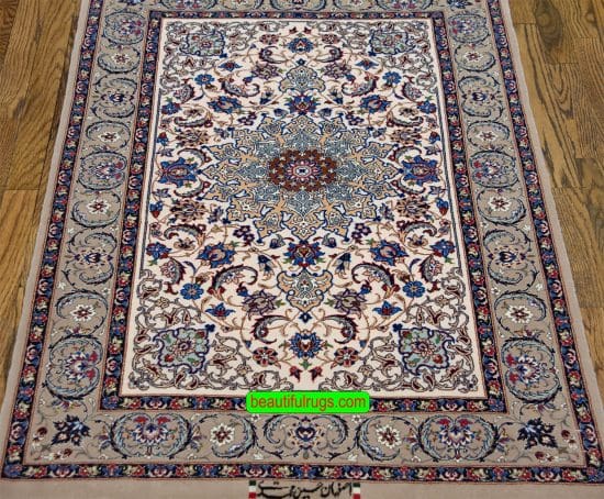 Fine quality handmade Persian floral rug made of kork wool and silk in beige color. Size 2.10x4.4.