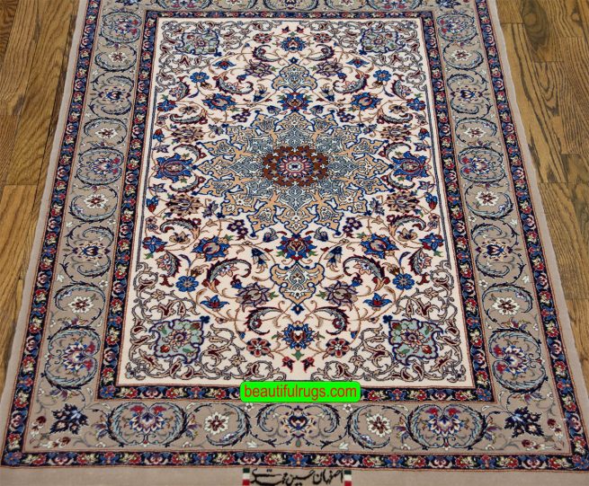 Fine quality handmade Persian floral rug made of kork wool and silk in beige color. Size 2.10x4.4.
