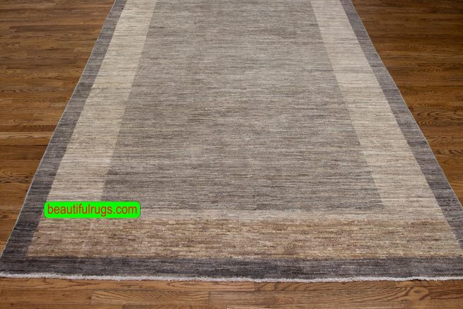 Handmade contemporary Gabbeh wool rug with brown and earth tone colors. Size 6.3x10.2