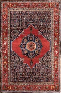 Handmade antique Persian Senneh rug, geometric and floral pattern with terracotta and navy-blue colors. Size 4.8x7.2.