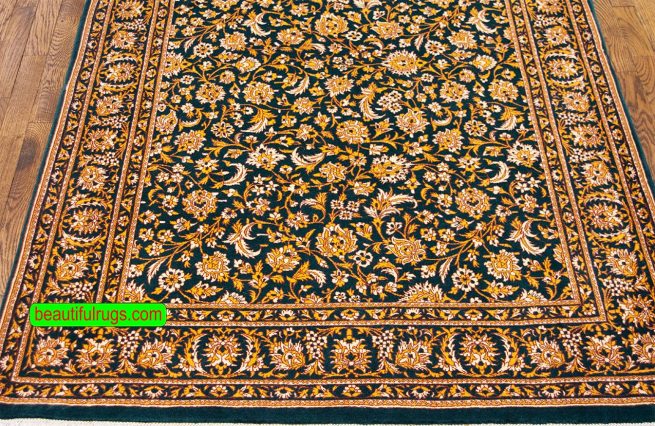 Handmade Persian Qum rug with green and gold colors made of kork wool. Size 4.2x6.2.