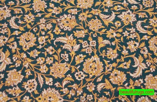 Handmade Persian Qum rug with green and gold colors made of kork wool. Size 4.2x6.2.