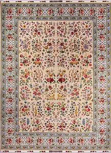 A gorgeous hand knotted multicolor floral Persian Tabriz rug woven by Azim Zadeh the renowned weaver of Iran. Size 9.6x13.6.