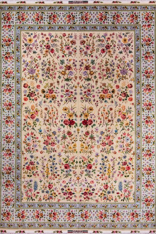A gorgeous hand knotted multicolor floral Persian Tabriz rug woven by Azim Zadeh the renowned weaver of Iran. Size 9.6x13.6.
