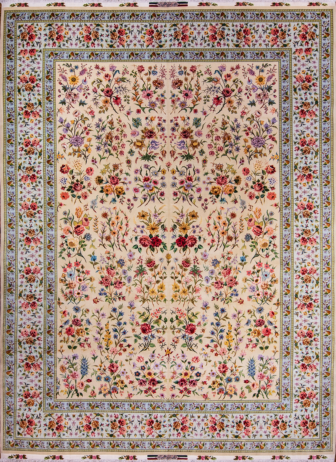 A gorgeous hand knotted multicolor floral Persian Tabriz rug woven by Azim Zadeh the renowned weaver of Iran. Size 9.6x13.6.