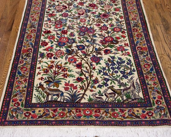 A colorful handmade Persian Sarouk tree of life rug with birds and animals. Size 3.5x5.2.