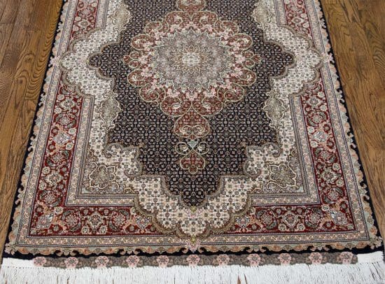 A matching area rug, handmade Persian Tabriz wool and silk in black color. Size 3.4x5.5.