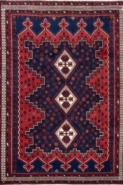 Hand knotted thick pile Persian Shiraz wool rug in geometric style and red color. Size 5.7x7.10.