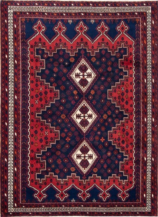 Hand knotted thick pile Persian Shiraz wool rug in geometric style and red color. Size 5.7x7.10.