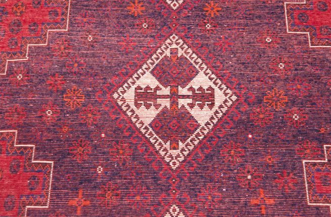 Hand knotted thick pile Persian Shiraz wool rug in geometric style and red color. Size 5.7x7.10.