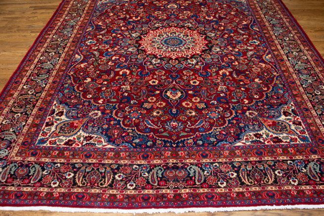 Handmade Persian Mood area rug, floral design with red and navy blue colors. Size 8.5x11.8.
